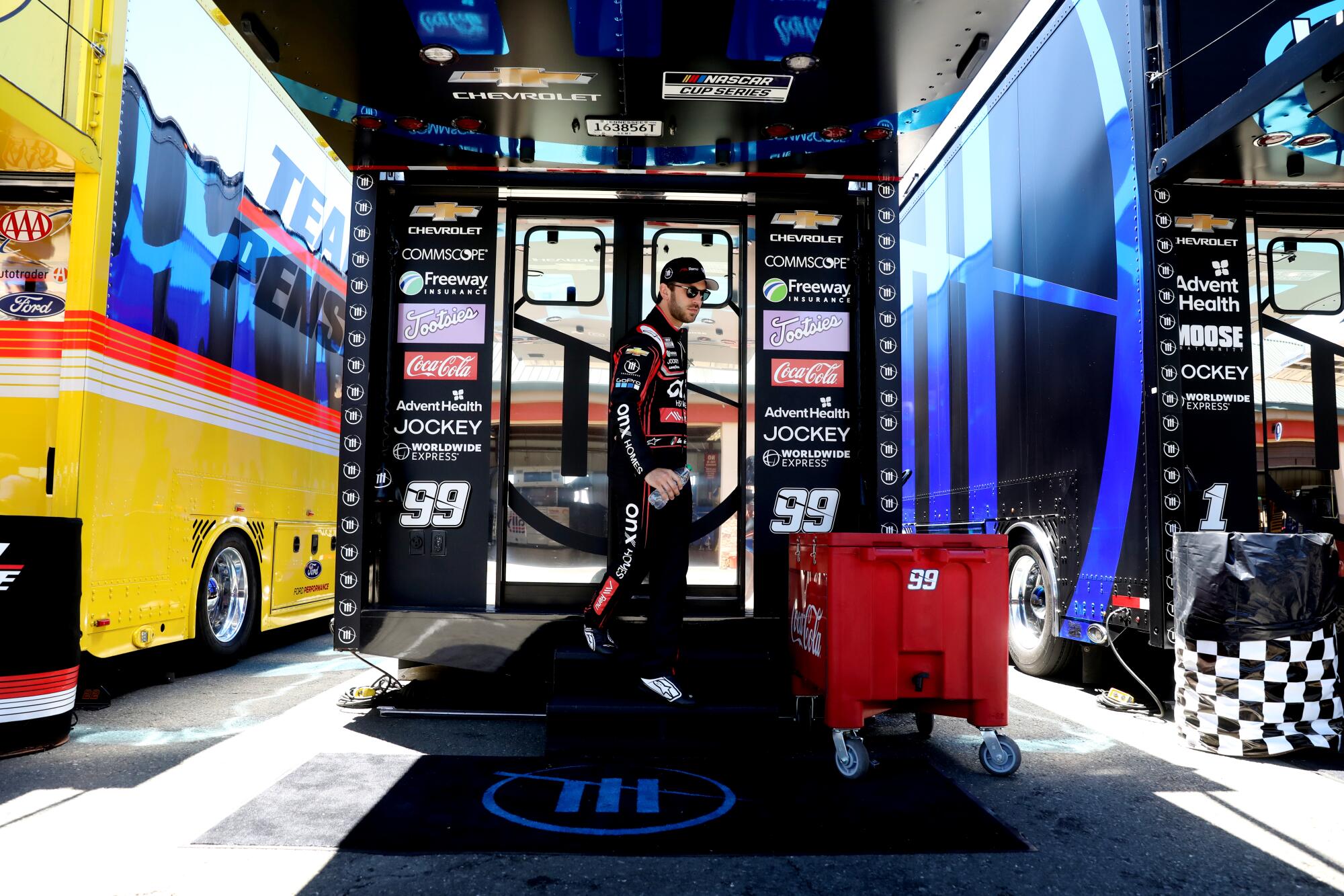 Daniel Suarez exits the team Trackhouse Racing hauler