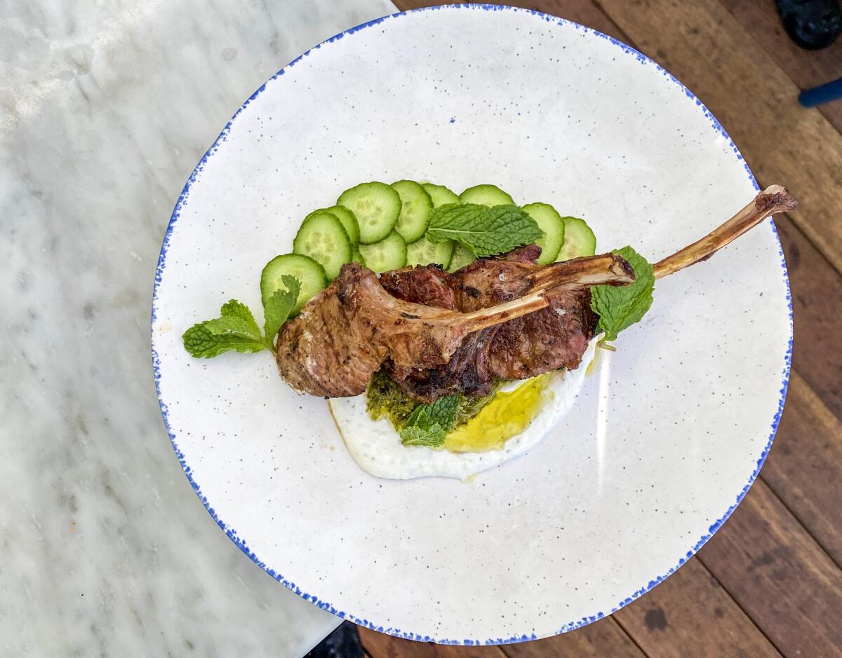Lamb chops with tzatziki and salted cucumbers at Greekman's.
