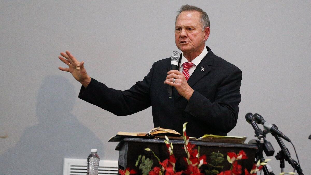 Former Alabama chief justice and U.S. Senate candidate Roy Moore speaks at a revival on Nov. 14, 2017, in Jackson, Ala.