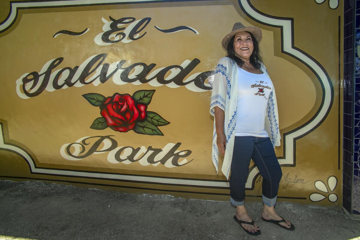 Artist Marina Aguilera and her El Salvador Park mural.