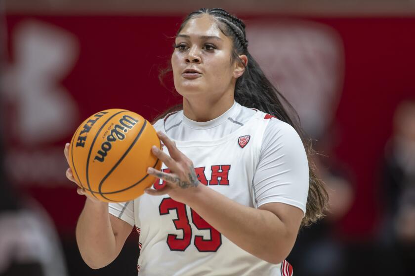 Utah forward Alissa Pili looks to pass the ball during a game Dec. 14, 2022, in Salt Lake City.
