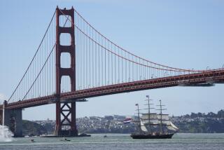 The Dutch tall ship Stad Amsterdam sails under the Golden Gate Bridge in this view from Sausalito, Calif., Sunday, March 24, 2024. The ship is sailing for Honolulu and then Tokyo, continuing on its world tour. (AP Photo/Eric Risberg)