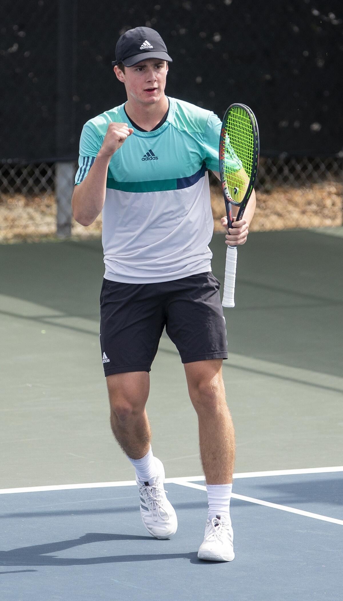 Daniel Day of Laguna Beach pumps his fist in the boys' 18-and-under round of 64 singles match at the USTA Southern California Junior Sectional Championships in Fountain Valley on Wednesday.