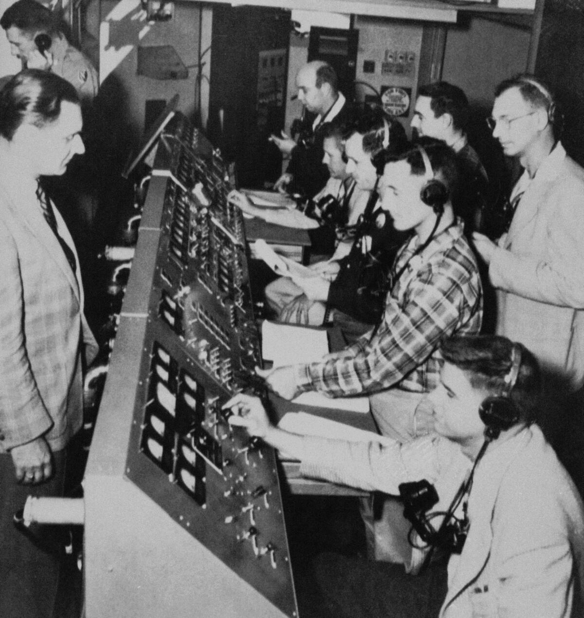 The Explorer 1 launch team works during countdown in Cape Canaveral.