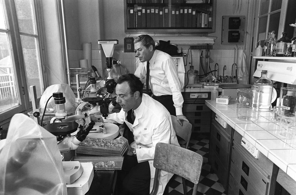 Francois Jacob, left and Jacques Monod are shown in their laboratory at the Pasteur Institute.