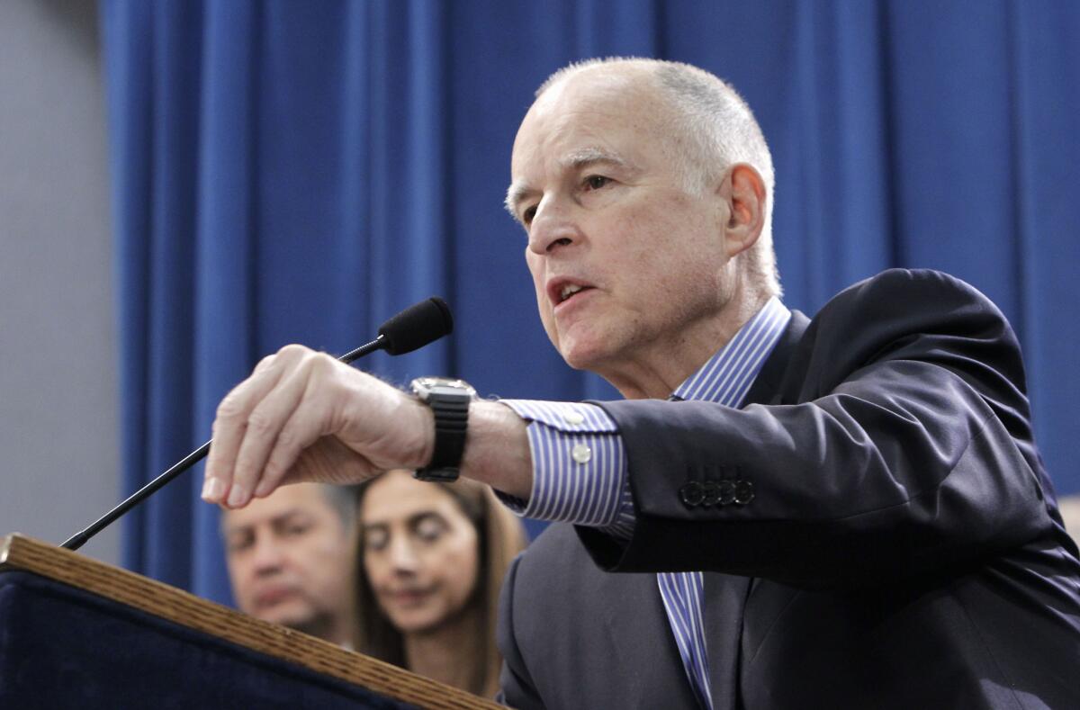 Gov. Jerry Brown talks about the education spending reforms included in his proposed state budget at a Capitol news conference Wednesday.