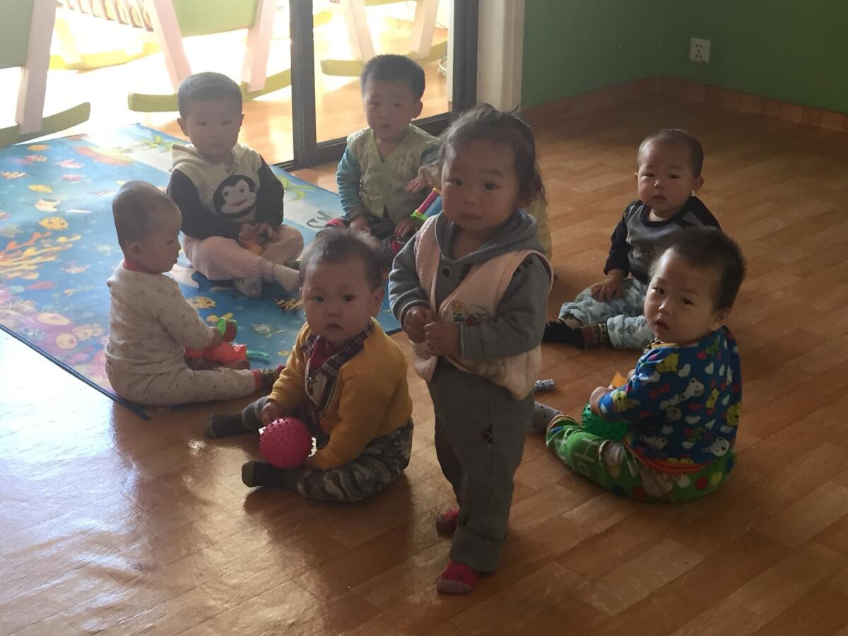 Toddlers at the Changchon farm nursery school. (Julie Makinen / Los Angeles Times)