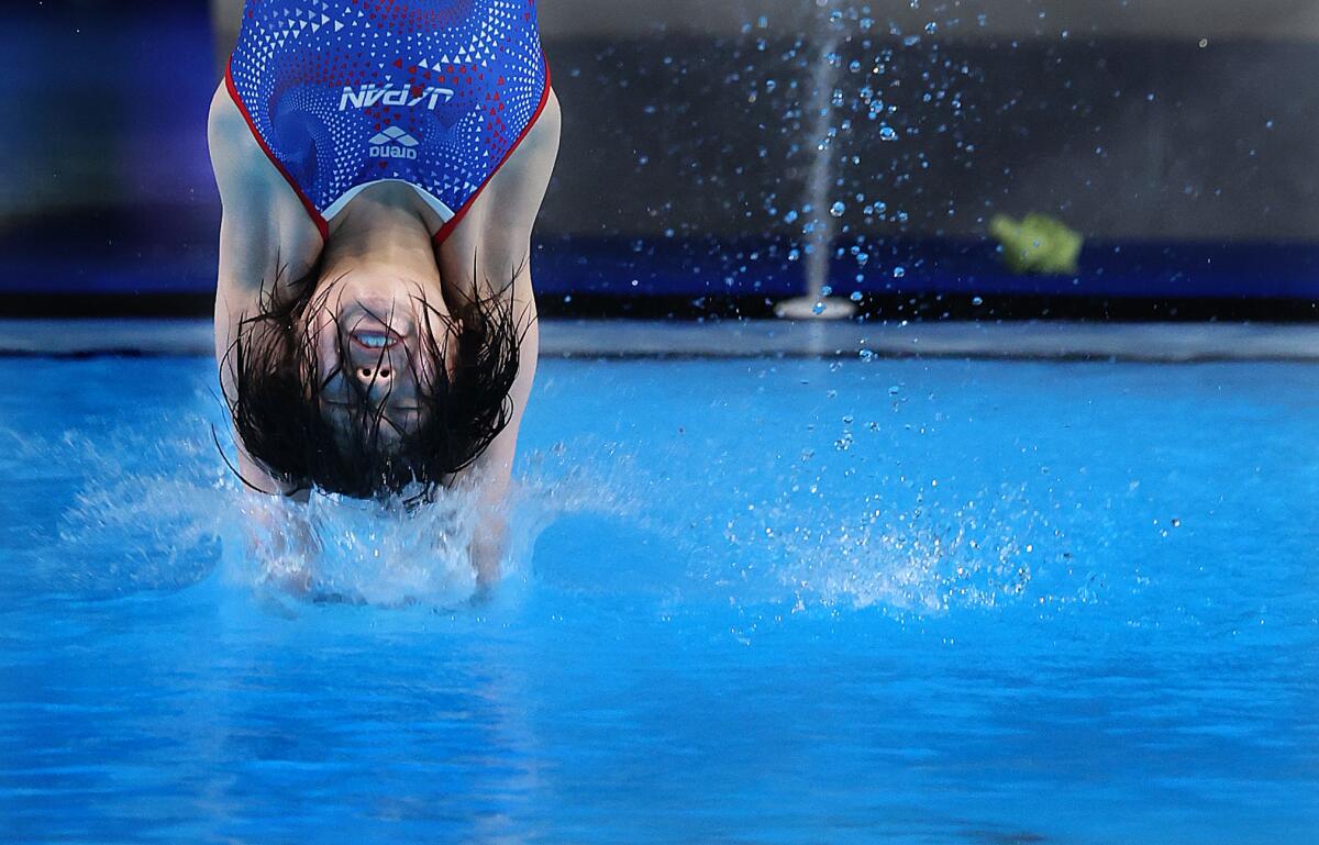 Japan's Matsuri Arai completes a dive in the women's 10-meter platform preliminaries Monday.