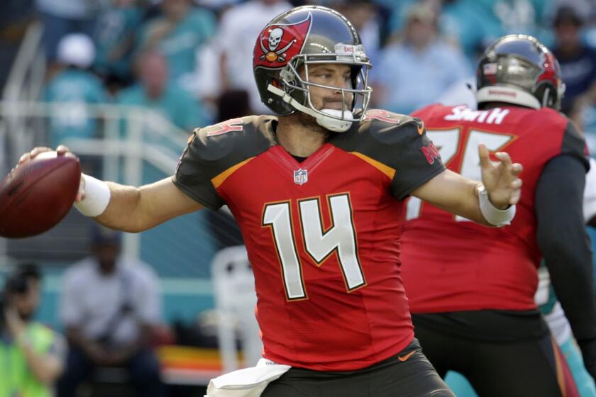 FILE - In this Sunday, Nov. 19, 2017 file photo, Tampa Bay Buccaneers quarterback Ryan Fitzpatrick (14) looks to pass, during the first half of an NFL football game against the Miami Dolphins in Miami Gardens, Fla. By the time Jameis Winston takes another snap in a NFL game, the Tampa Bay Buccaneers will have a better idea of how much the young quarterbackâs suspension for violating the league's personal conduct policy will impact the team's playoff hopes. The Bucs consider themselves fortunate to have Ryan Fitzpatrick, entering his 14th season, filling in. (AP Photo/Lynne Sladky)
