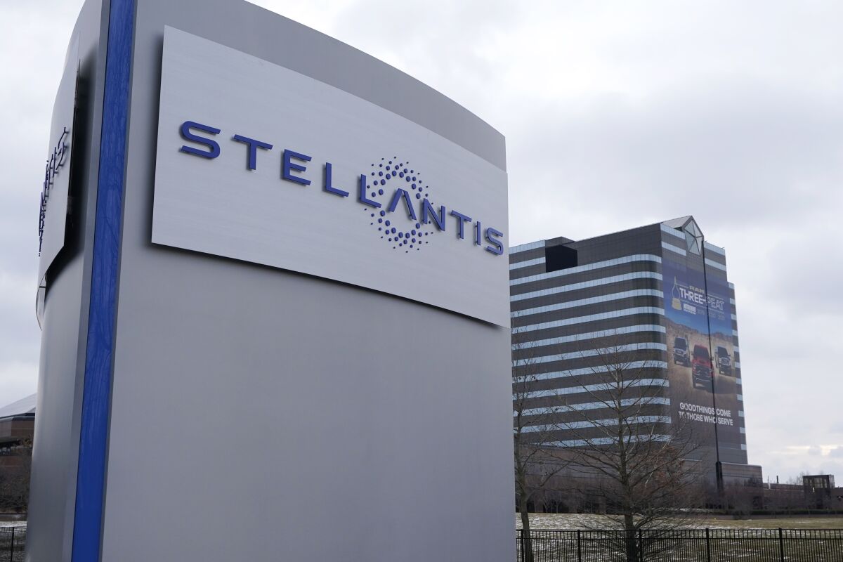 FILE - In this file photo taken on Jan. 19, 2021, the Stellantis sign is seen outside the Chrysler Technology Center, in Auburn Hills, Mich. Automaker Stellantis said Monday, May 2, 2022 it will invest $3.6 billion Canadian dollars ($2.8 billion) to upgrade two Canadian assembly plants and expand a research center as it accelerates its long-term electrification strategy. (AP Photo/Carlos Osorio, File)