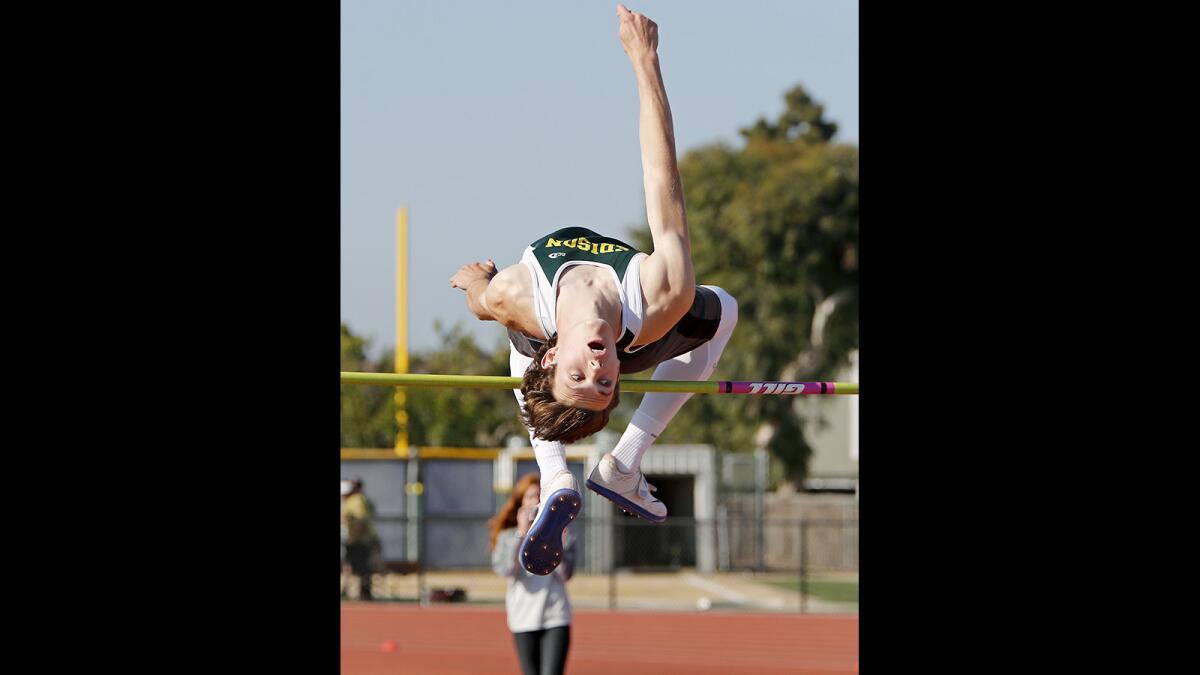 Edison High's Aiden Garnett clears 6 feet, 4 inches during the Surf League finals at Los Alamitos on Friday.