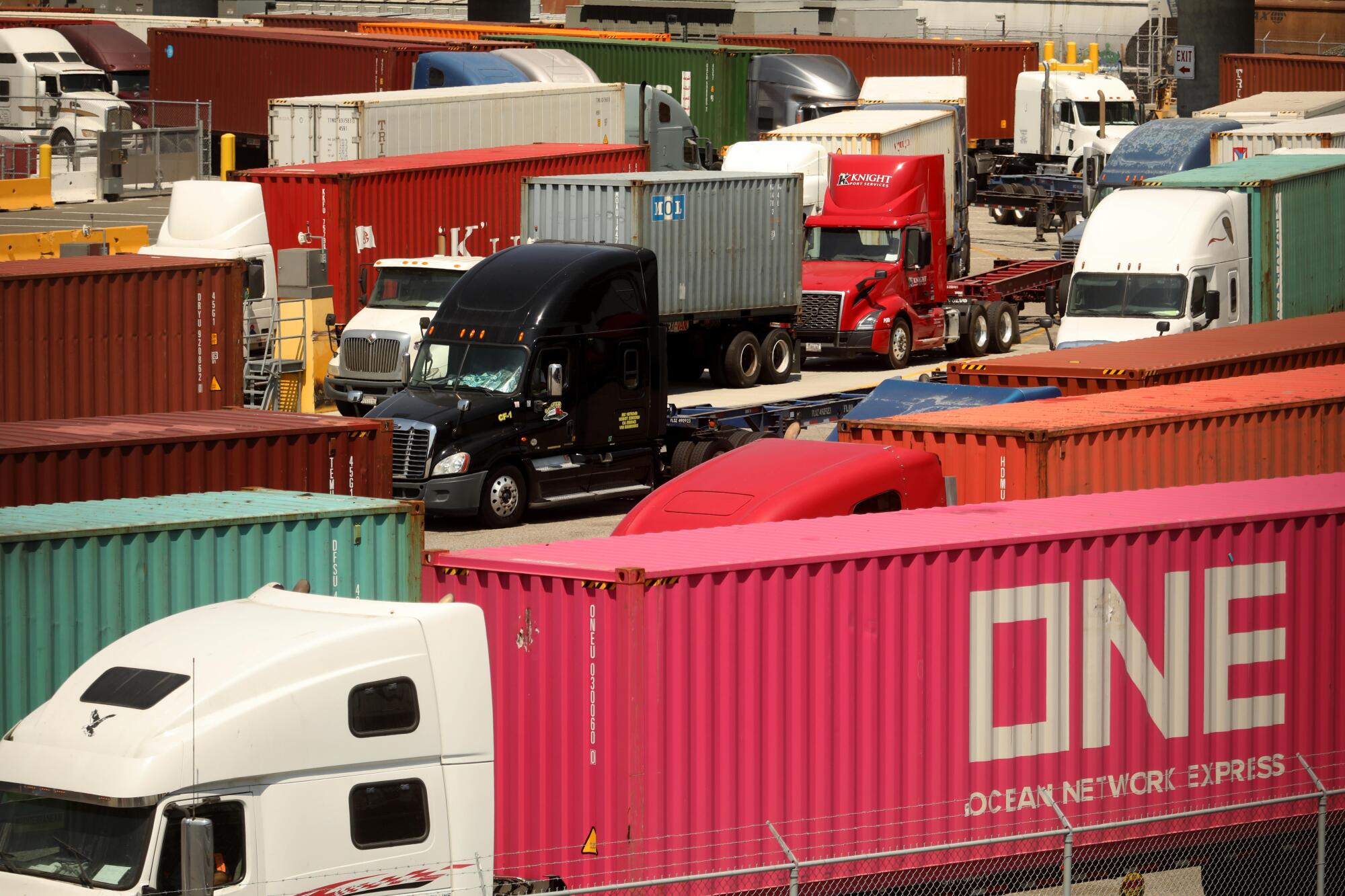 Trucks line up to drop off cargo at the Port of Los Angeles in August 2020.