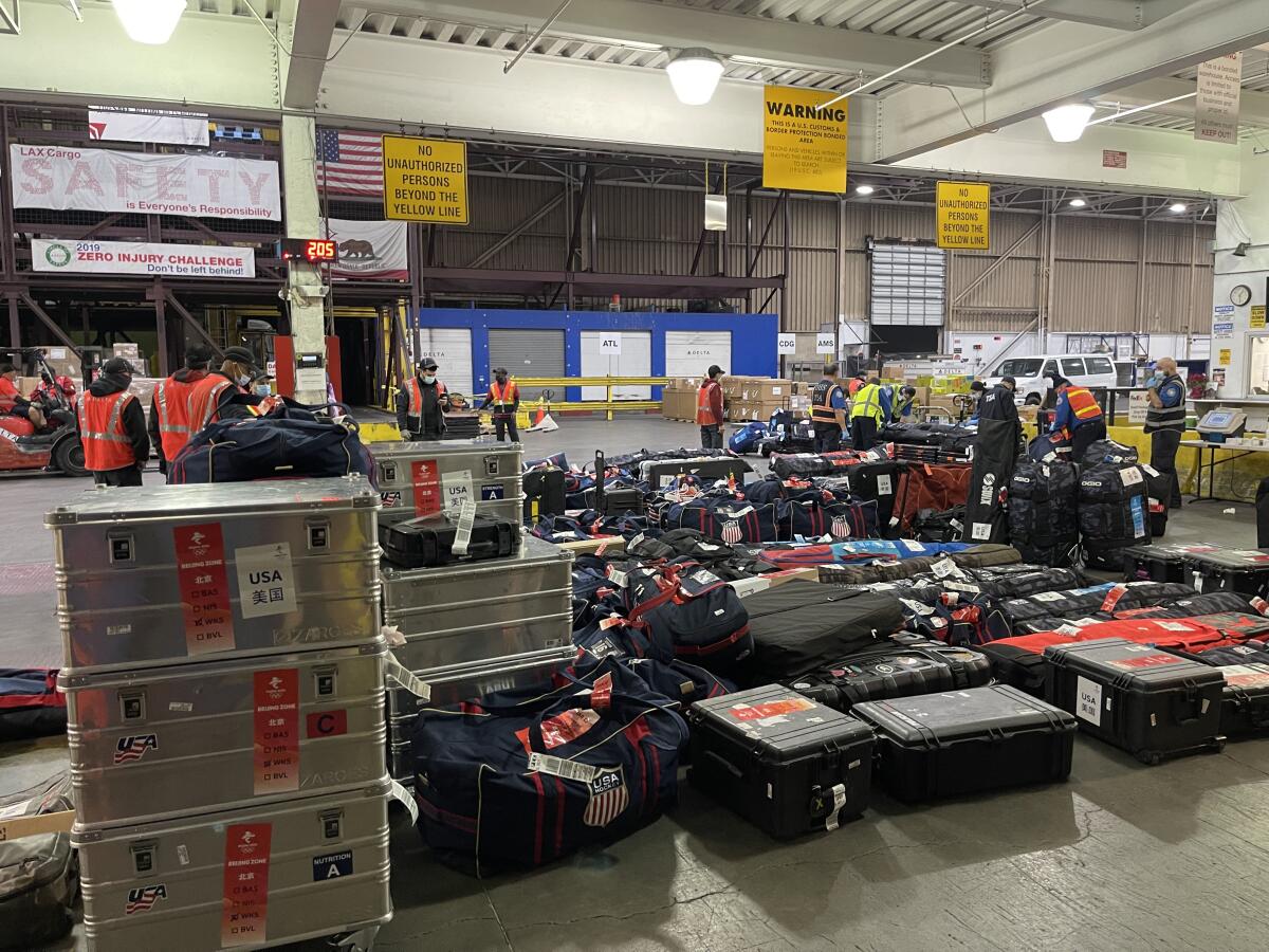 U.S. Olympic team luggage waiting to be shipped to Beijing ahead of the Winter Olympics.