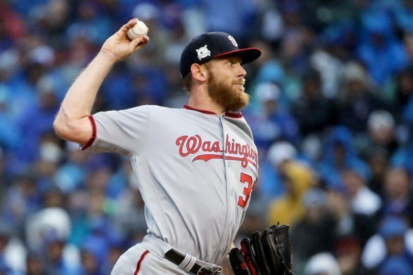 CHICAGO, IL - OCTOBER 11: Stephen Strasburg #37 of the Washington Nationals pitches in the second inning during game four of the National League Division Series against the Chicago Cubs at Wrigley Field on October 11, 2017 in Chicago, Illinois. (Photo by Jonathan Daniel/Getty Images) ** OUTS - ELSENT, FPG, CM - OUTS * NM, PH, VA if sourced by CT, LA or MoD **