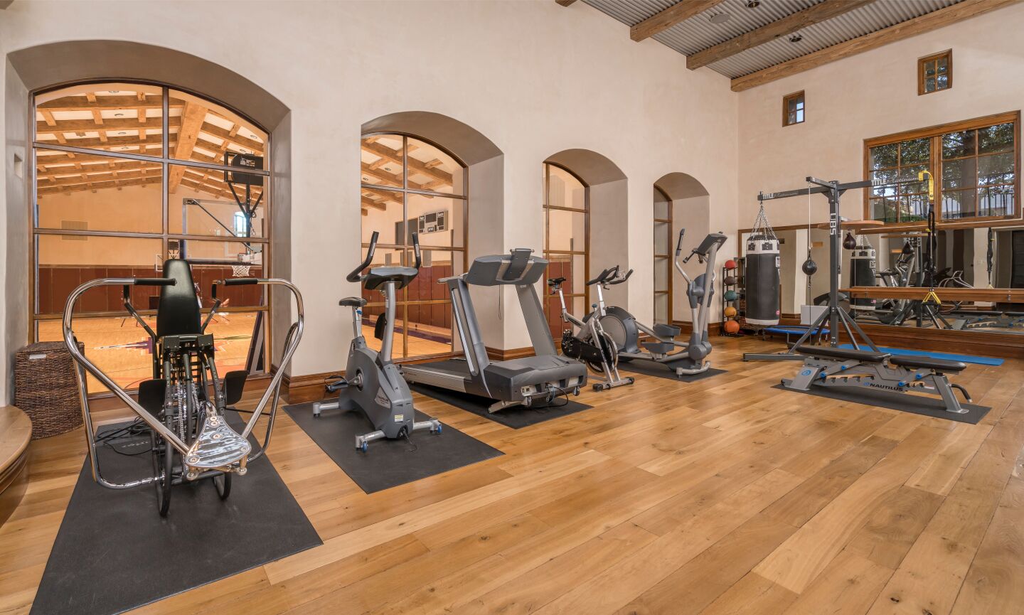 The gym with various kinds of exercise equipment.