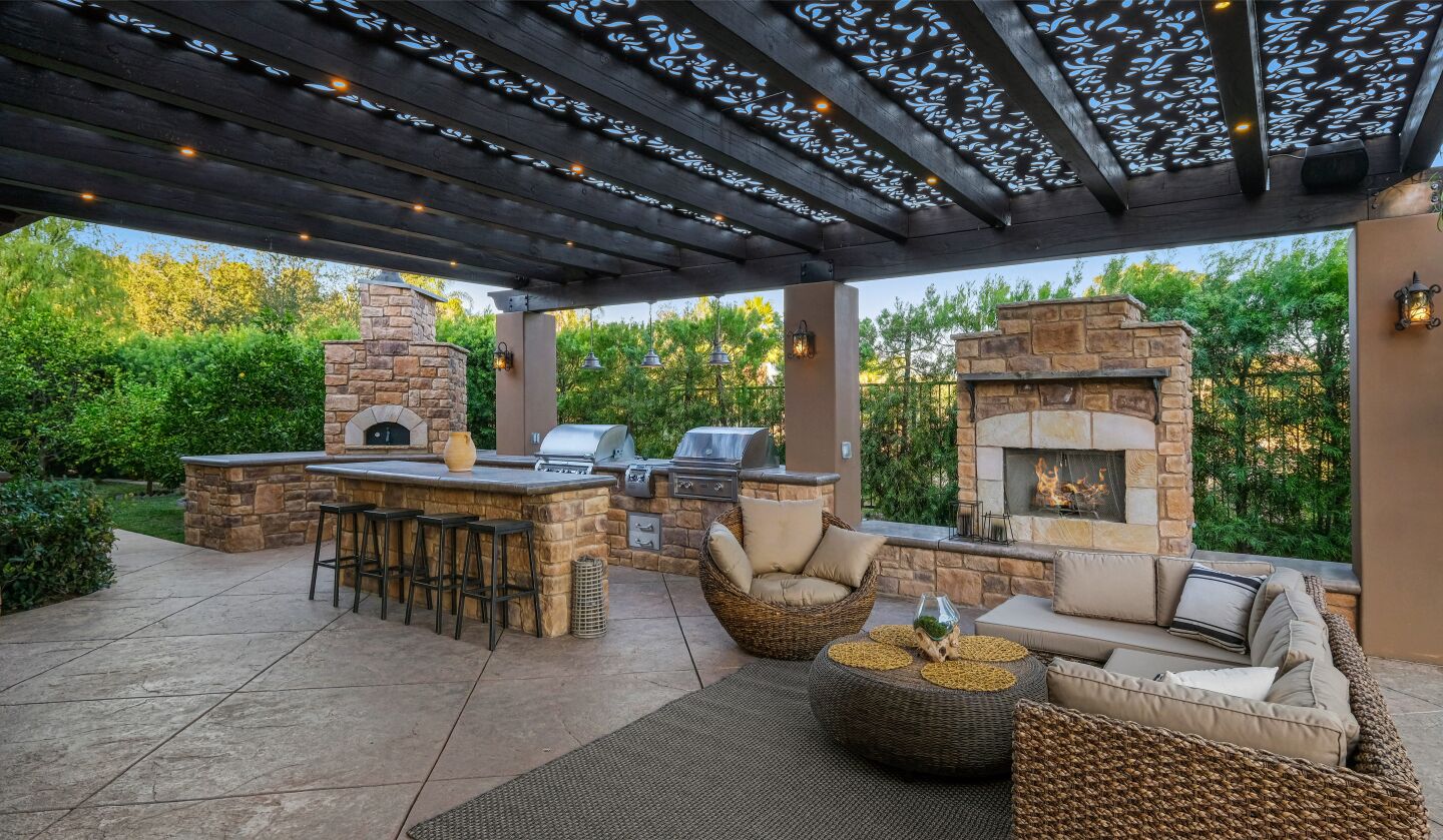 The outdoor fireplace.