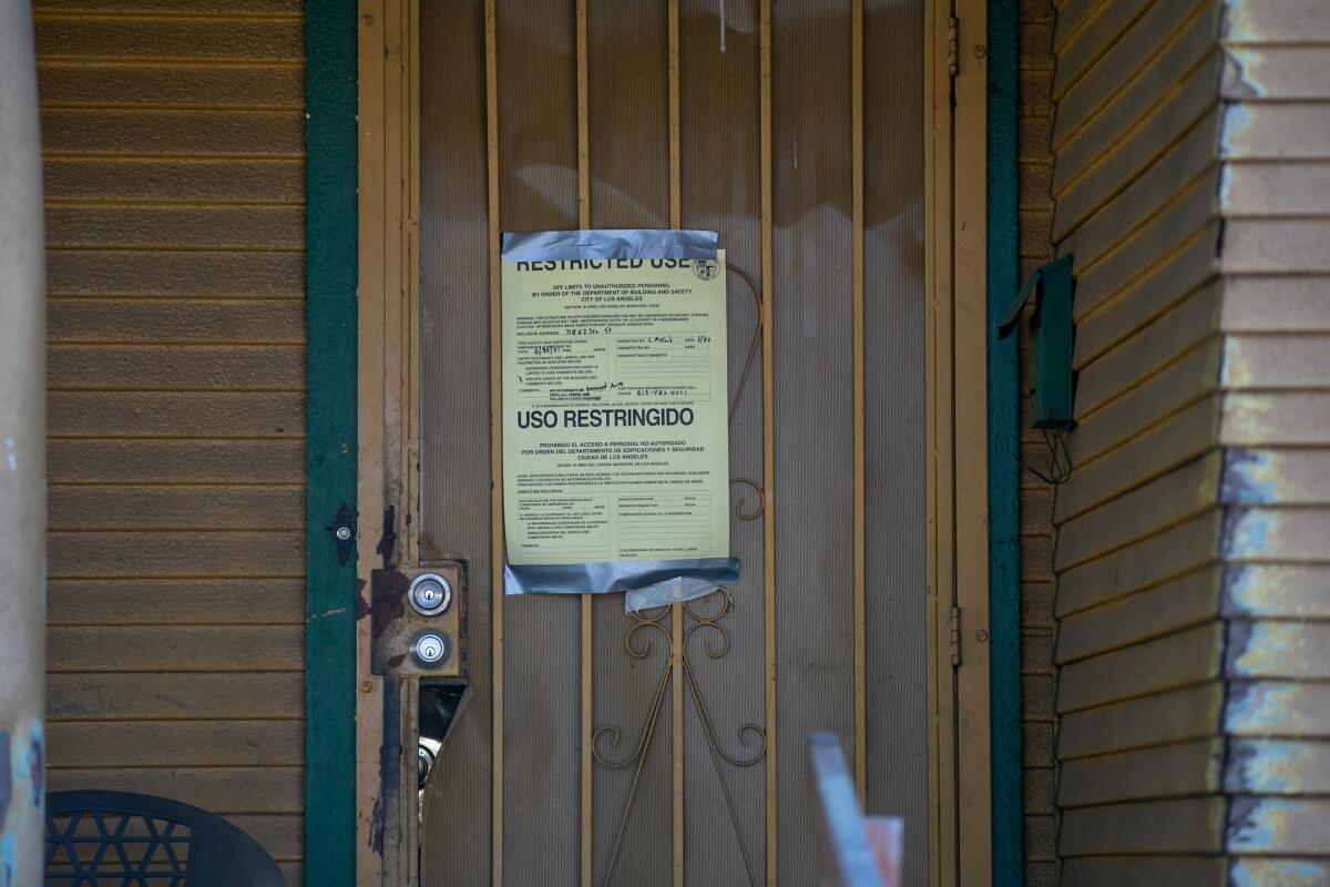 Yellow-tagged home in South L.A. following June 30 fireworks explosion by LAPD.