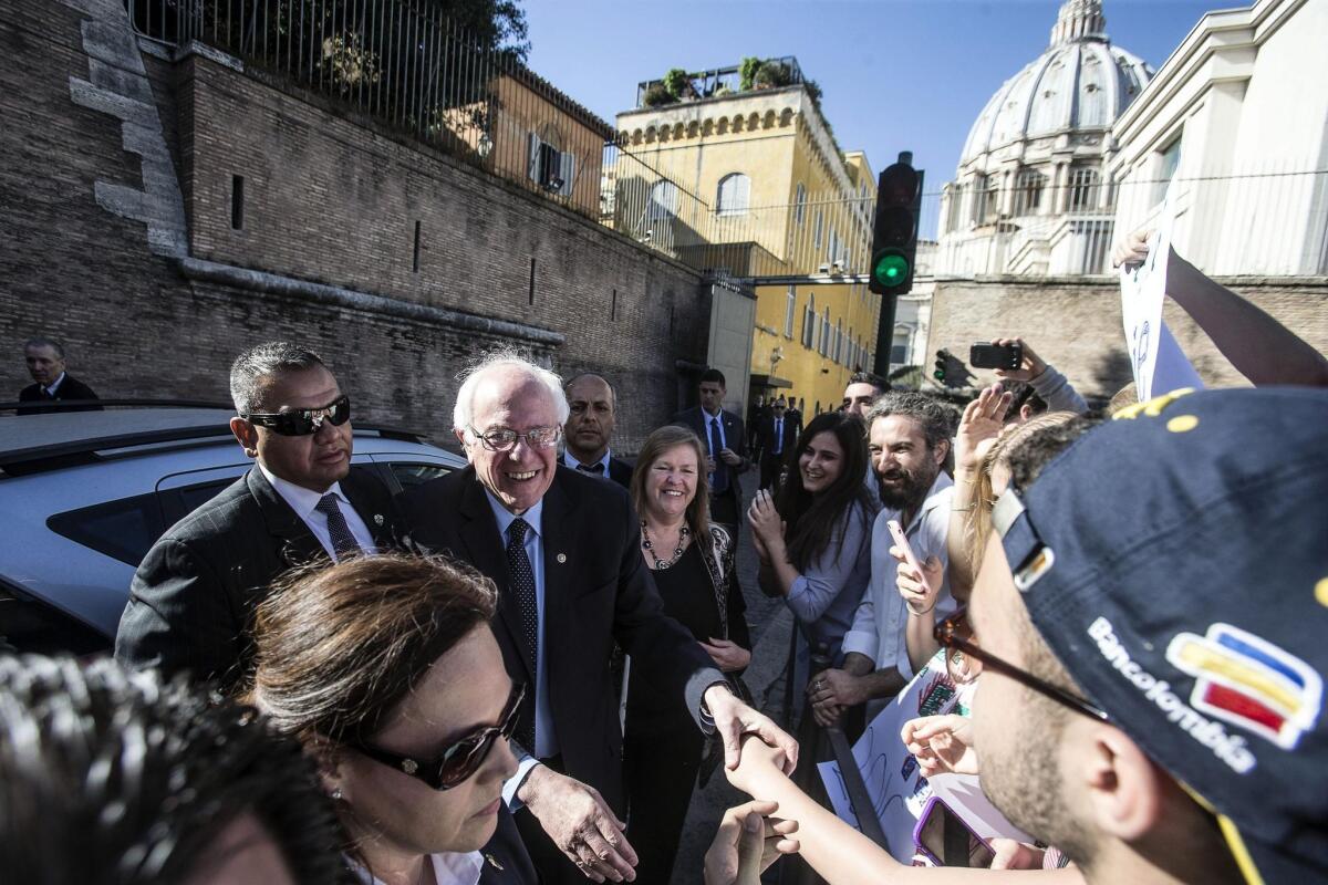 Democratic presidential candidate Bernie Sanders leaves the Vatican.