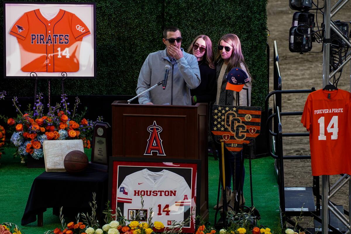 JJ Altobelli, with Lexi Altobelli and Carly Konigsfeld, speaks at Angel Stadium Feb. 10.