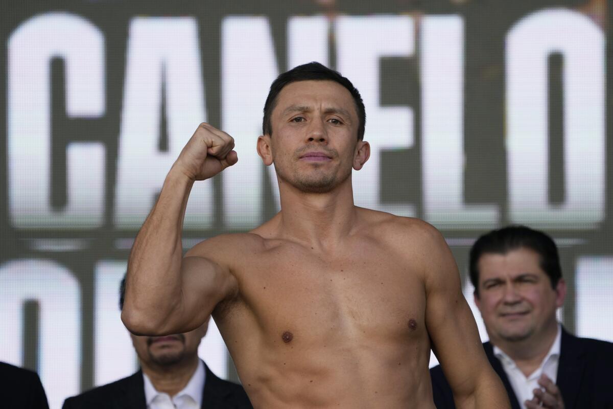Gennadiy Golovkin poses on the scale during a ceremonial weigh-in Friday in Las Vegas. 