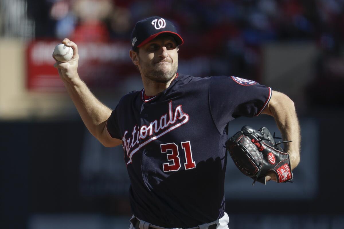 The Nationals' Max Scherzer delivers a pitch against the Cardinals during Game 2 of the NLCS on Oct. 12, 2019.