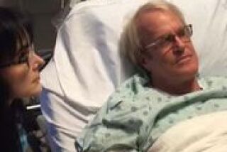 Composer, radio and TV personality John Tesh undergoes a chemotherapy treatment for cancer with wife Connie Sellecca.