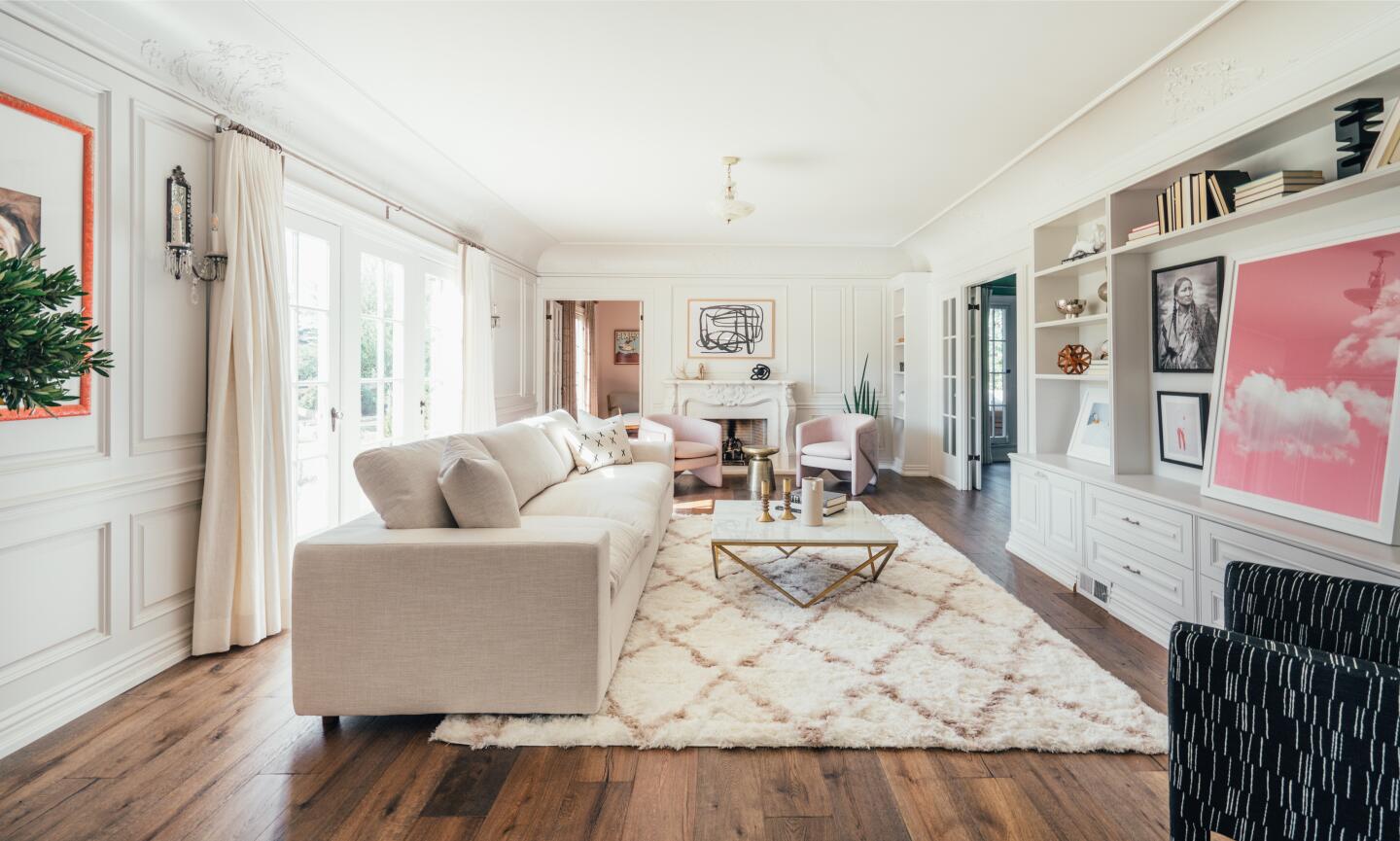 Built in 1923, the elegant abode boasts four bedrooms, four bathrooms and formal living spaces with old-school style across 3,282 square feet.