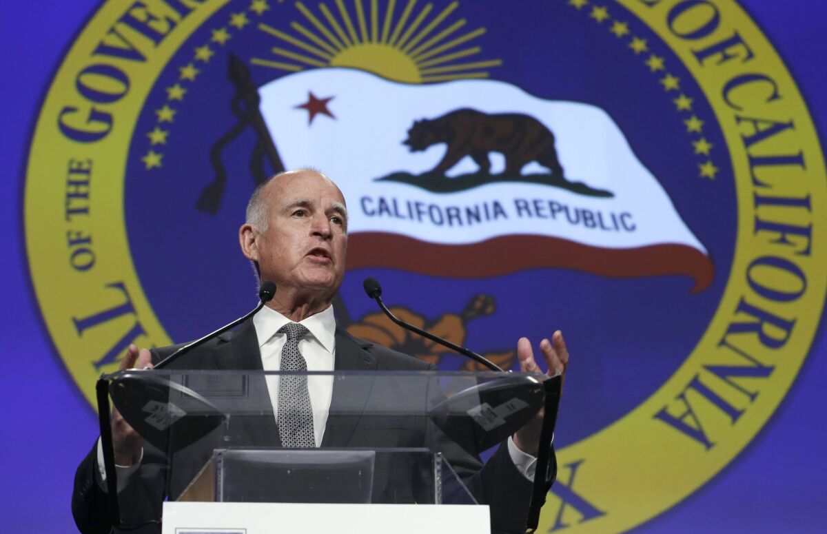On Monday, Gov. Jerry Brown signed a measure striking the word “alien” — seen as derogatory to those not born in the U.S. — from California's labor laws.