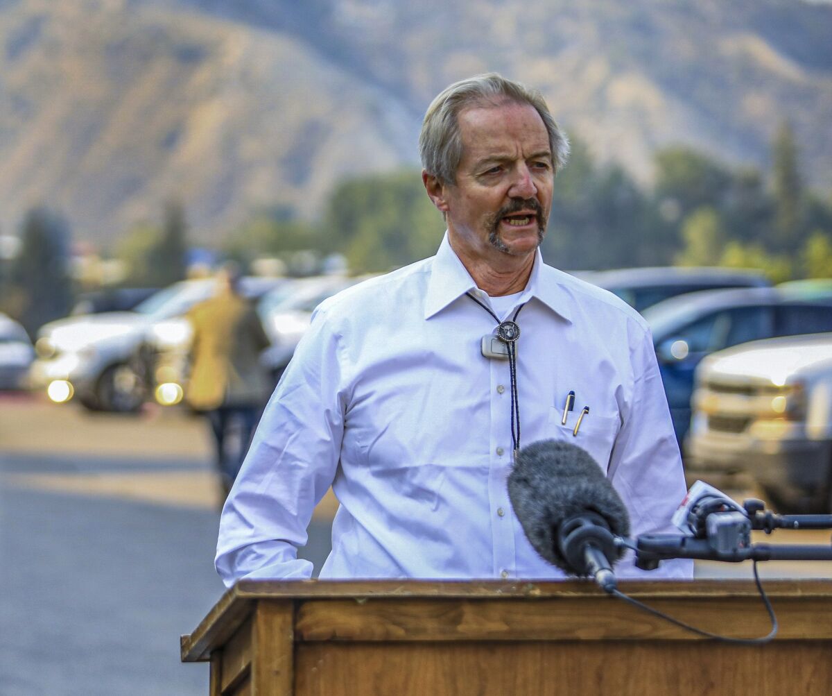 FILE - In this Aug. 14, 2020, file photo, William Perry Pendley, acting director of the Bureau of Land Management, speaks to the media on the Grizzly Creek Fire in Eagle, Colo. A federal judge has ruled that the Trump administration's leading steward of public lands has been serving unlawfully and blocked him from continuing in the position. U.S. District Judge Brian Morris said Friday, Sept. 25, 2020, that U.S. Bureau of Land Management acting director William Perry Pendley was never confirmed to the post by the U.S. Senate and served unlawfully for 424 days. Montana's Democratic governor had sued to remove Pendley, saying the the former oil industry attorney was illegally overseeing a government agency that manages almost a quarter-billion acres of land, primarily in the U.S. West. (Chris Dillmann/Vail Daily via AP, File)