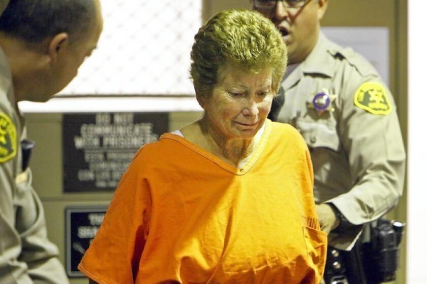 Lois Goodman, a tennis umpire accused of bludgeoning her husband to death at their Woodland Hills home earlier this year, appears at her arraignment in Van Nuys on Wednesday.