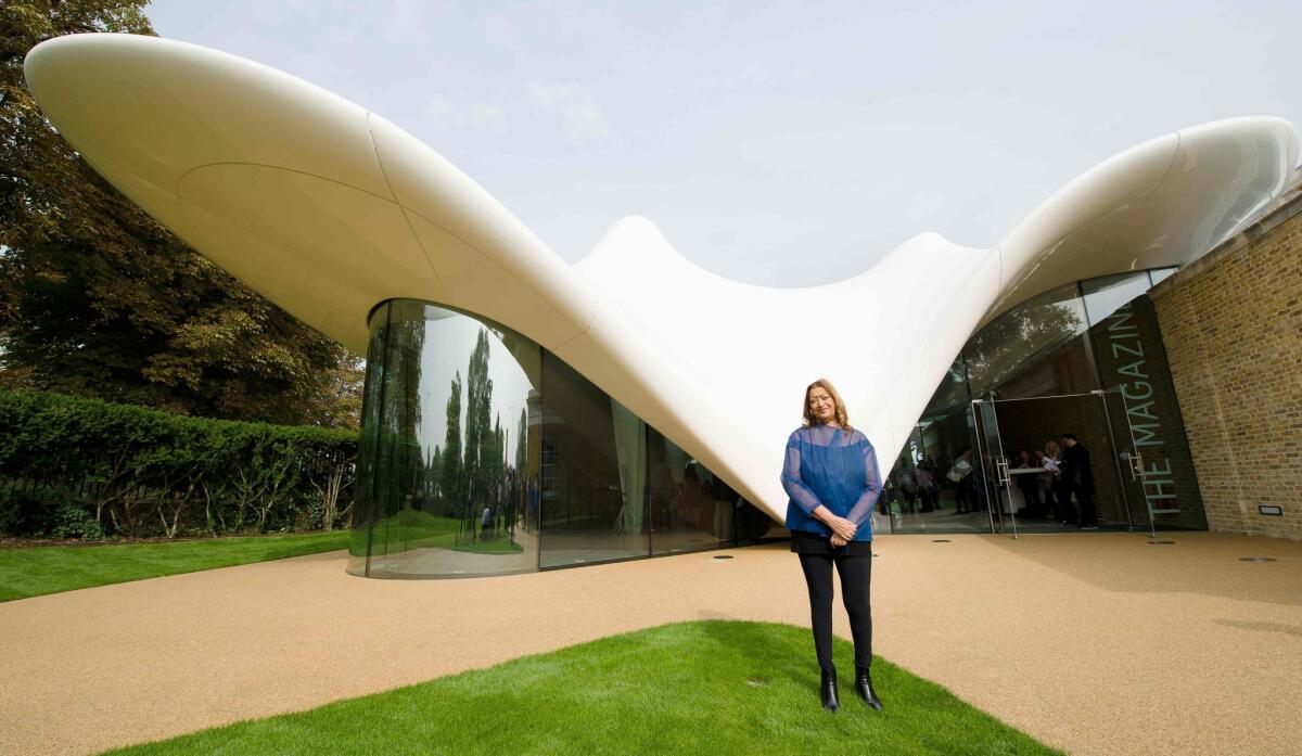 Zaha Hadid stands before her design for the Serpentine Sackler Gallery in London in 2013.