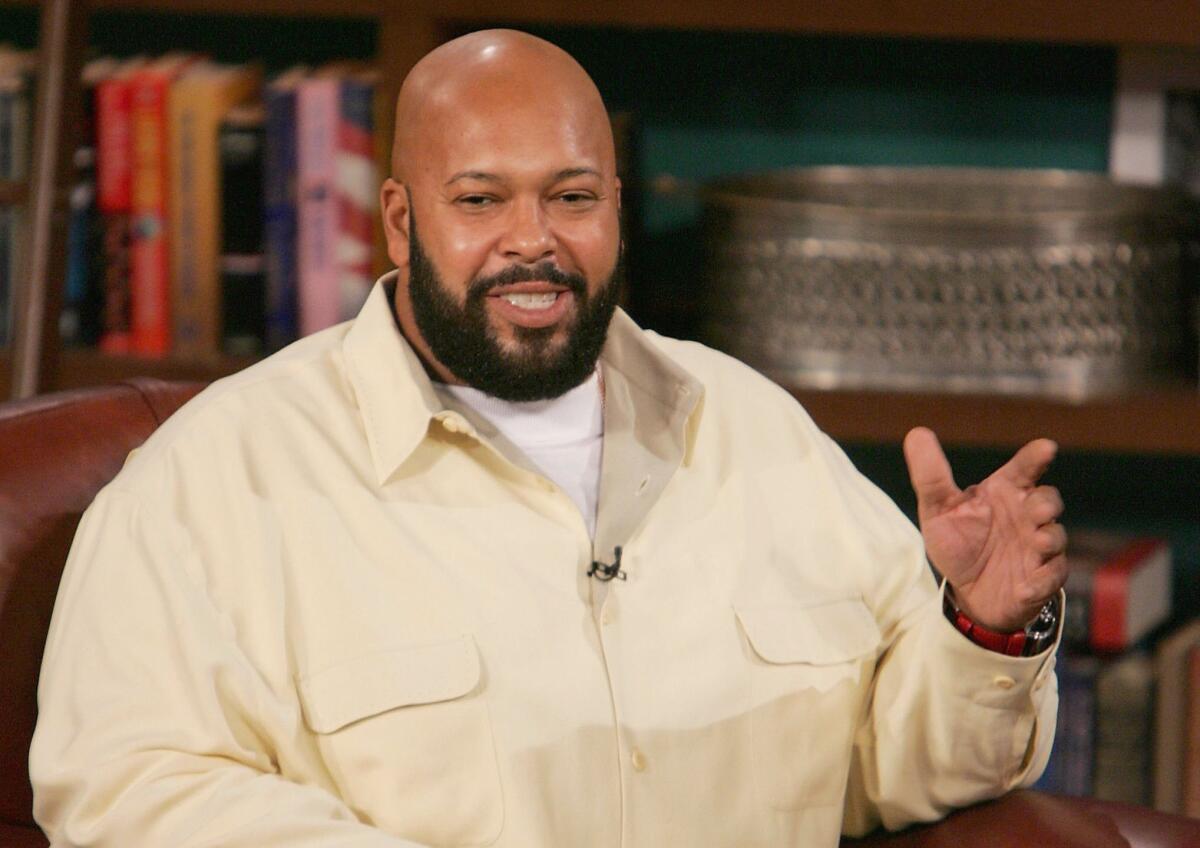 Music producer Marion "Suge" Knight, shown in 2004, was shot early Sunday morning in a West Hollywood nightclub, a law enforcement source said.