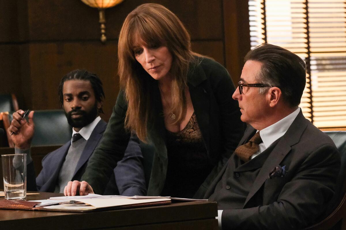Mo McRae, left, Katey Sagal and Andy Garcia in a courtroom