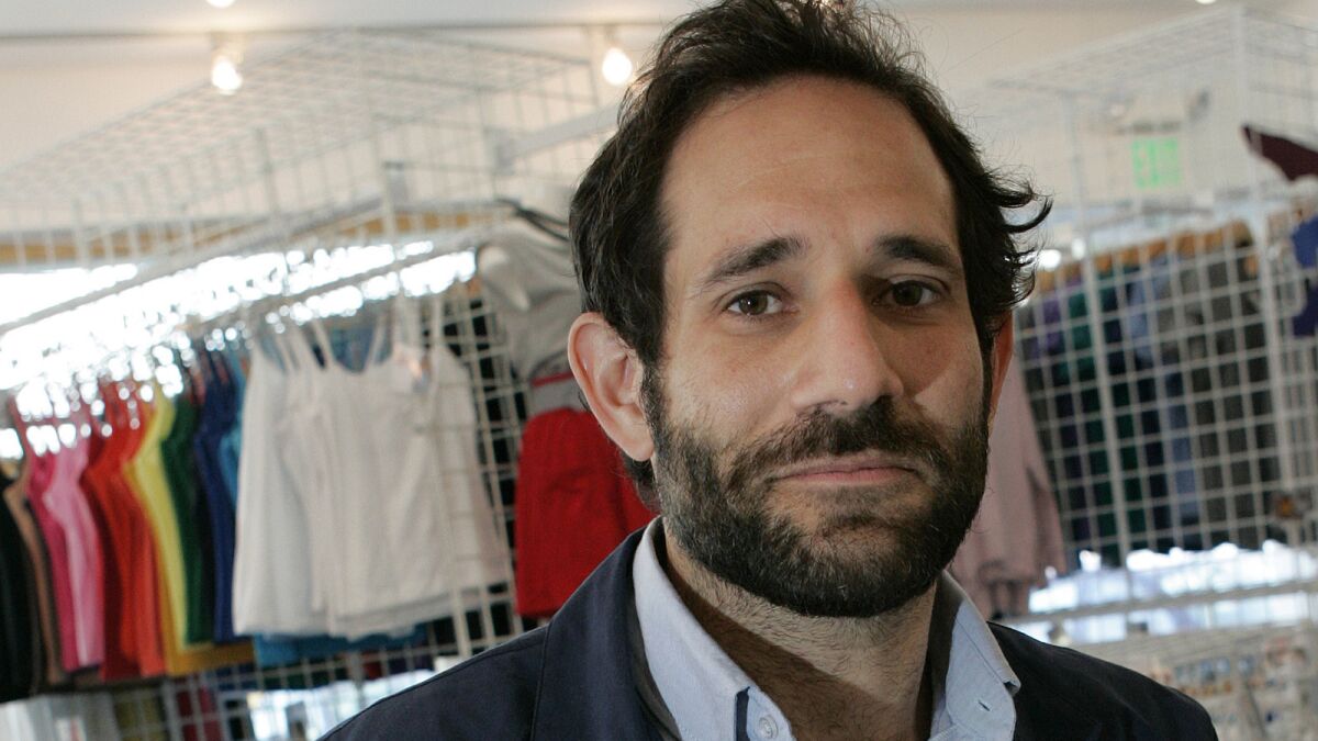 American Apparel chief Dov Charney is facing a sexual harassment suit. He denies the charges.