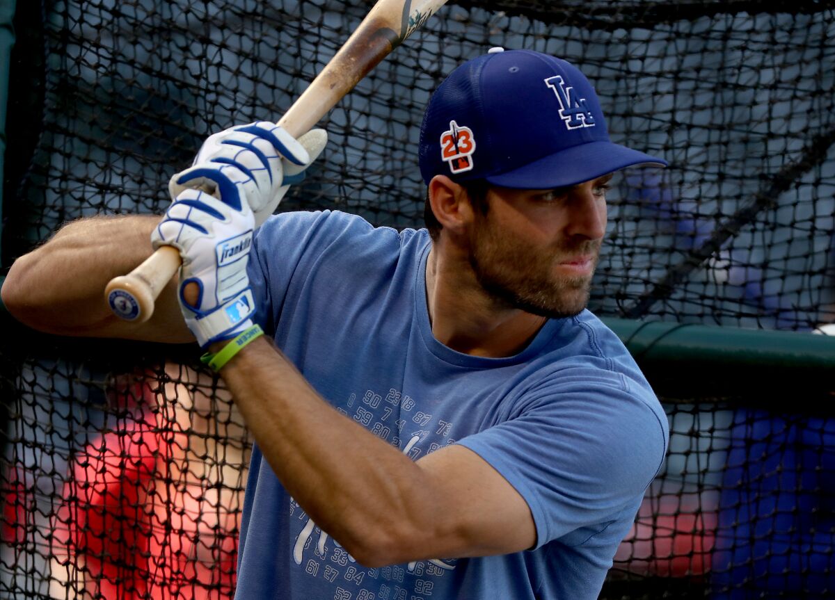 Dodgers outfielder Chris Taylor takes batting practice before a Freeway Series game against the Angels.