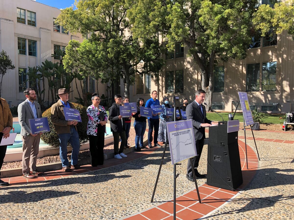 Assemblyman Chris Ward and other officials at a news conference at the San Diego County administration building.