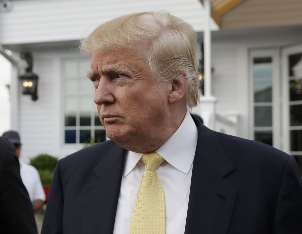 Republican presidential candidate Donald Trump arrives July 6 for a fundraising event at a golf course in the Bronx borough of New York.