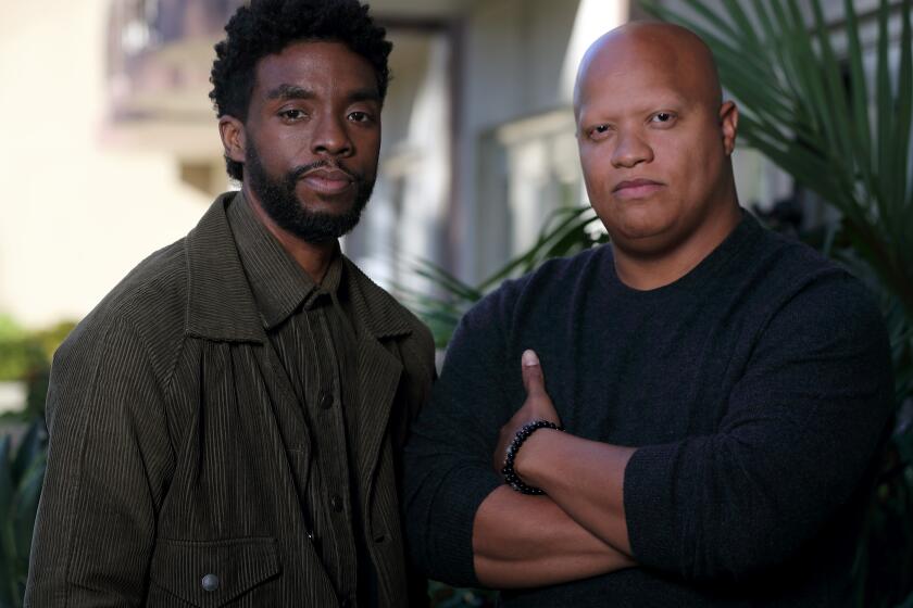 BEVERLY HILLS, CALIF. - NOV. 17, 2019. Chadwick Boseman and Logan Coles are the producers of "21 Bridges." (Luis Sinco/Los Angeles Times)