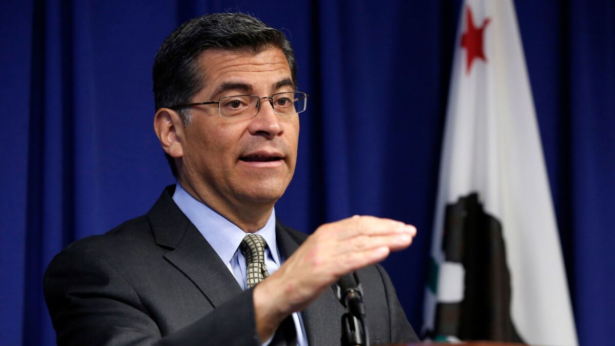 California Atty. Gen. Xavier Becerra speaks at a news conference in May in Sacramento.