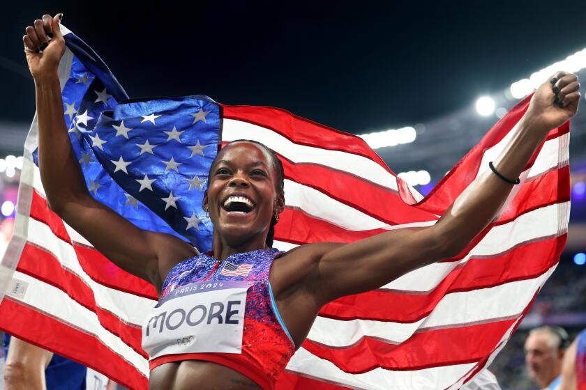 PARIS, FRANCE August 3, 2024-USA's Jasmine Moore celebrates the bronze medal.