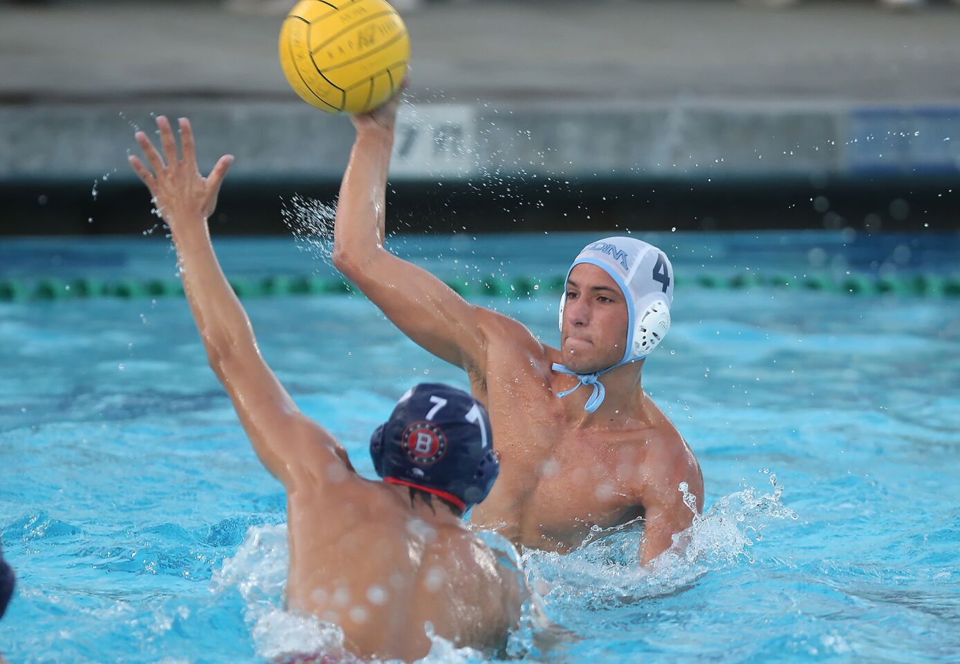 Corona del Mar's Tyler Harvey makes an interior pass during wild-card round of the CIF Southern Section Division 2 playoffs at Beckman on Tuesday.
