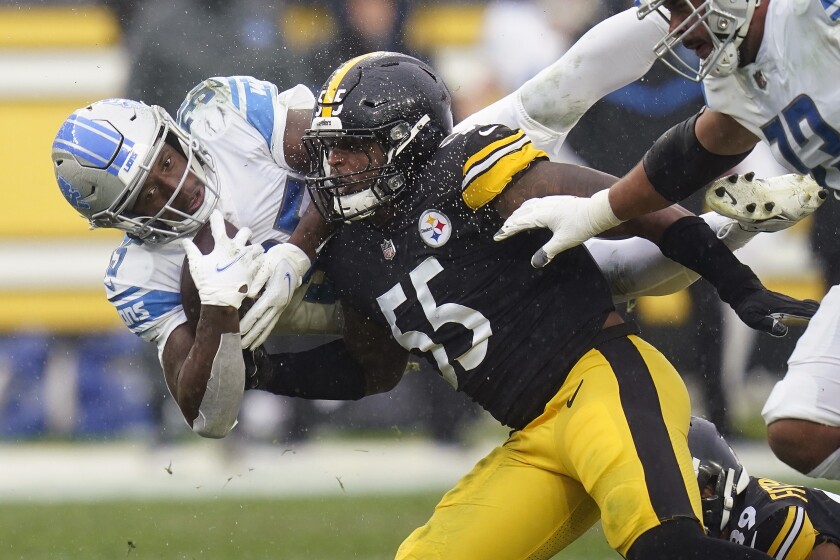 Pittsburgh Steelers inside linebacker Devin Bush (55) tackles Detroit Lions running back Godwin Igwebuike (35) during the second half of an NFL football game, Sunday, Nov. 14, 2021, in Pittsburgh. (AP Photo/Keith Srakocic)