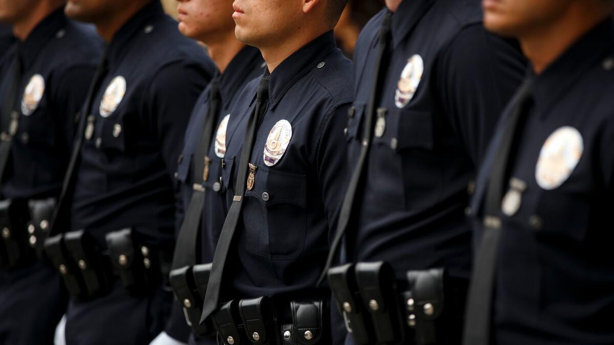 Los Angeles Police Department recruit officers graduate at the LAPD Parker Center Headquarters.