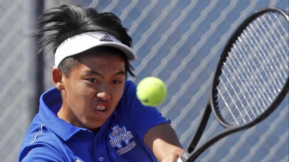 Ryan Trinh, shown competing on April 17, swept in singles play during Fountain Valley High's 18-0 win against Edison on Tuesday.