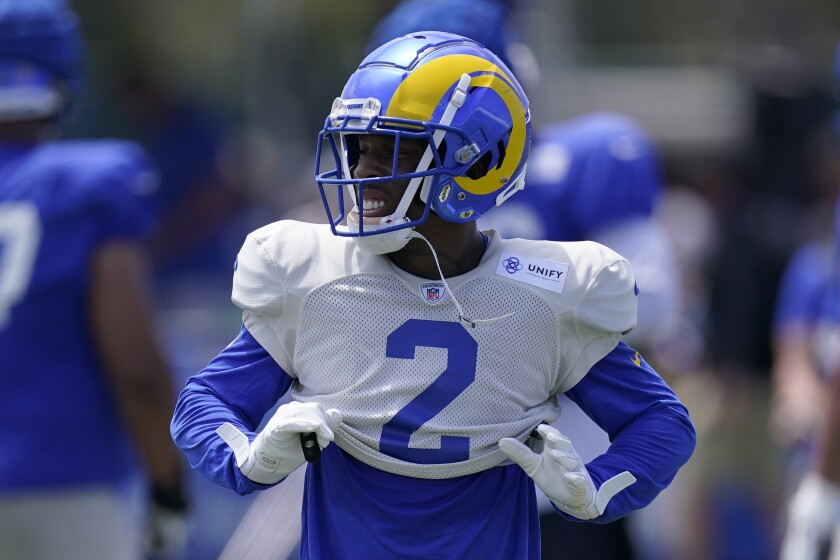 Rams cornerback Troy Hill stands on the field during practice July 30.