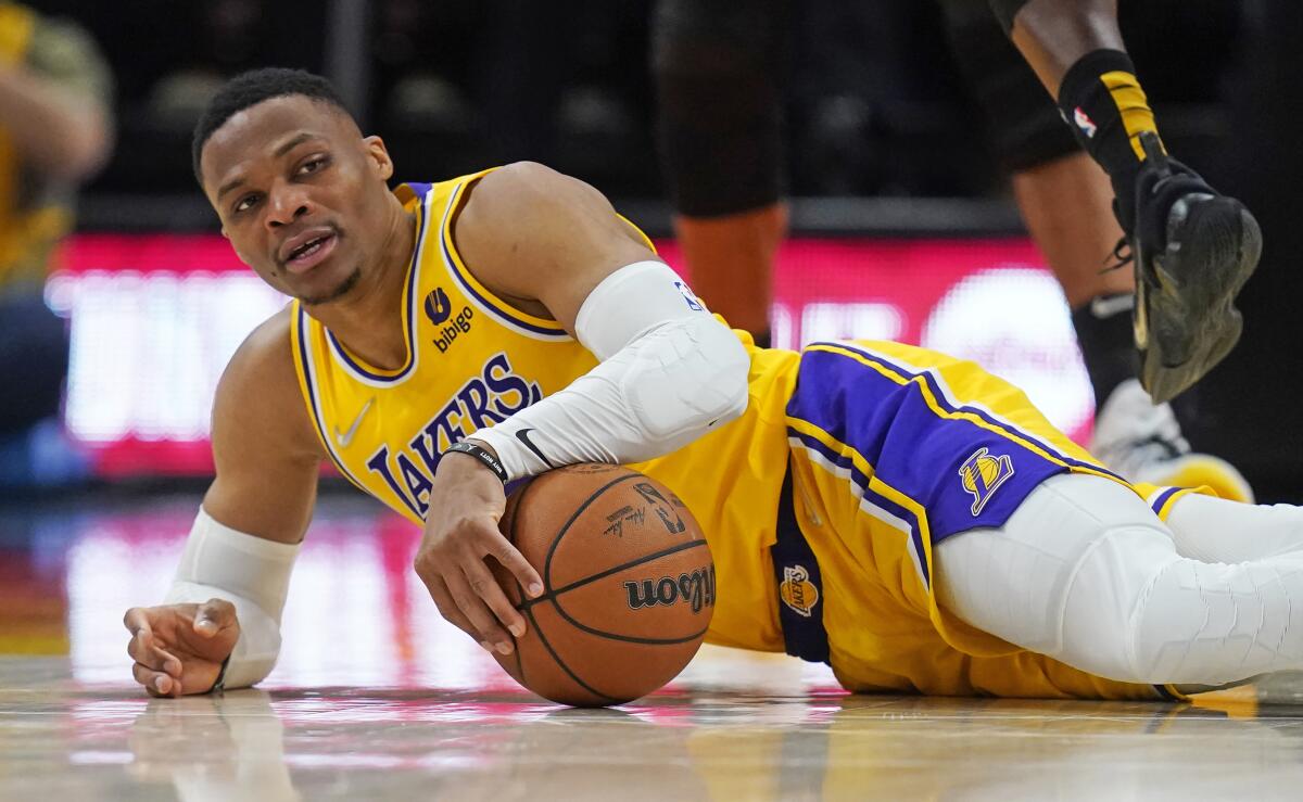 Lakers guard Russell Westbrook falls to the court against the Utah Jazz on March 31.
