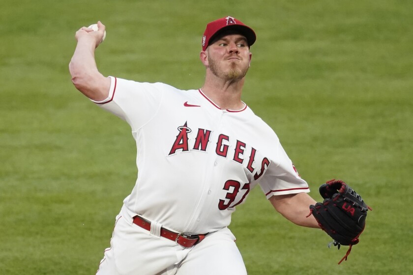 FILE - Los Angeles Angels starting pitcher Dylan Bundy (37) throws during the first inning of a baseball game against the Kansas City Royals Monday, June 7, 2021, in Los Angeles, Calif. The Minnesota Twins signed right-hander Dylan Bundy to a $5 million, one-year contract on Wednesday, Dec. 1, 2021 taking their first step toward rebuilding a depleted rotation. (AP Photo/Ashley Landis, File)