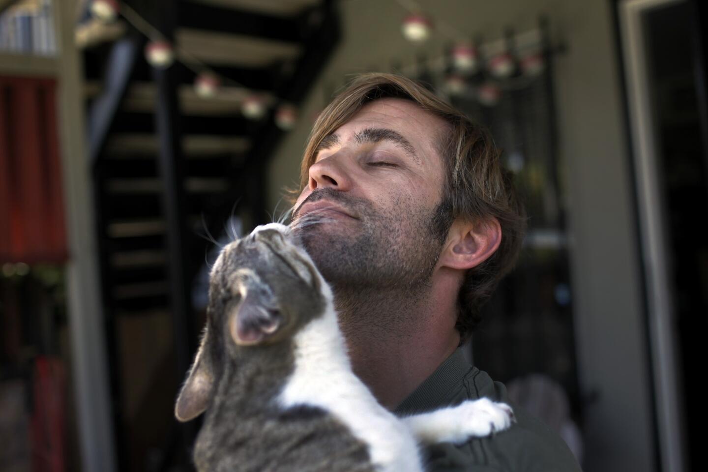 Seth Burnham, with his cat Griffin, has been acting since age 8. For the last three years, he's been in L.A. pursuing it as a career.