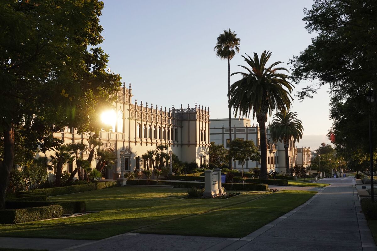 Sunlight reflects off windows of a building on the University of San Diego campus