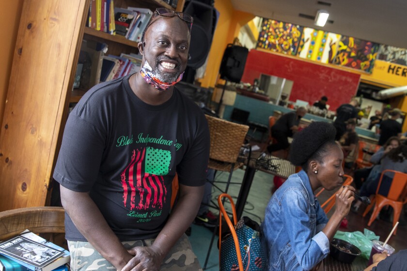 Tony Jolly, owner of Hot and Cool Cafe during Juneteenth celebration 